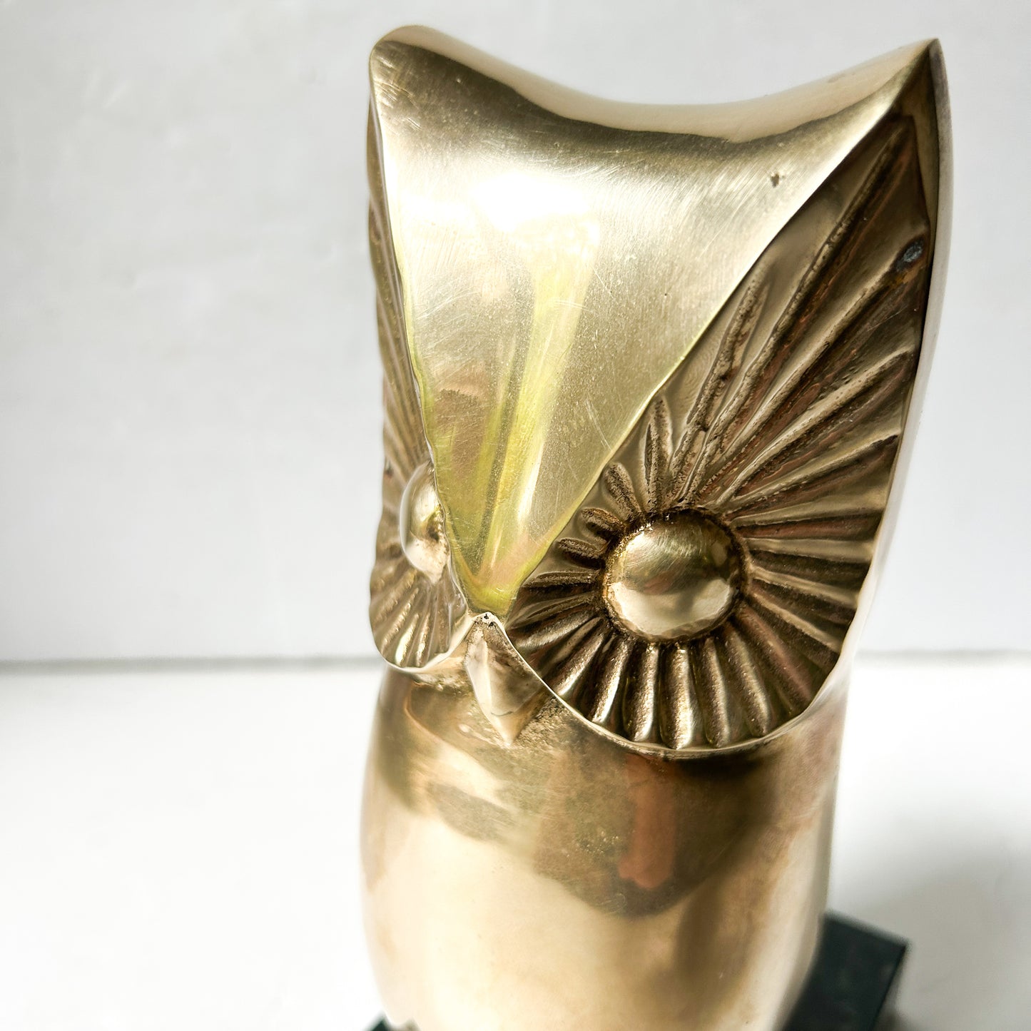 Vintage brass owl sculpture on green marble base